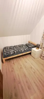 Łóżko lub łóżka w pokoju w obiekcie Domek pod Sosnową Górą 2