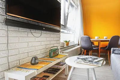 Telewizja i/lub zestaw kina domowego w obiekcie Zakochaj się we Wrocławiu