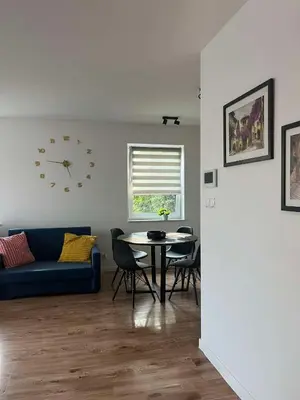 Część wypoczynkowa w obiekcie Apartament Andrea z balkonem