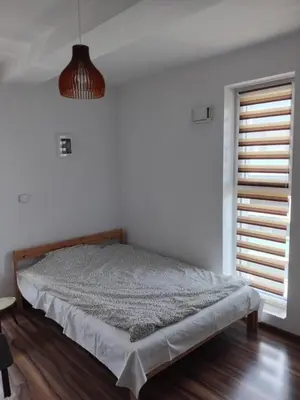 Łóżko lub łóżka w pokoju w obiekcie Apartament Karakorum Lokum Wrocław Borowska