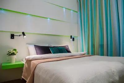 Łóżko lub łóżka w pokoju w obiekcie Mojito Apartments – Botanica