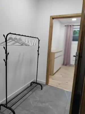Łóżko lub łóżka w pokoju w obiekcie Apartament na Krupie