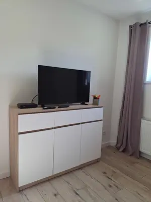 Telewizja i/lub zestaw kina domowego w obiekcie Apartament na Krupie