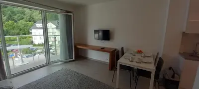 Telewizja i/lub zestaw kina domowego w obiekcie Mountain View Czarna Góra Resort