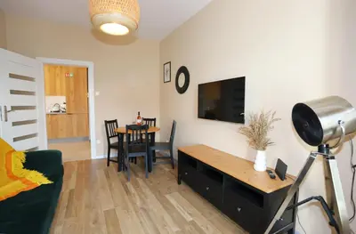 Telewizja i/lub zestaw kina domowego w obiekcie Apartament Sudeckie Boho