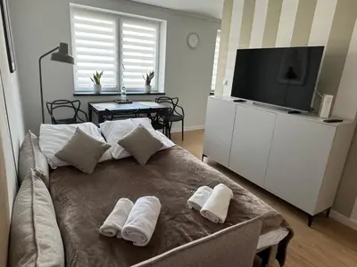 Telewizja i/lub zestaw kina domowego w obiekcie Apartament Duet