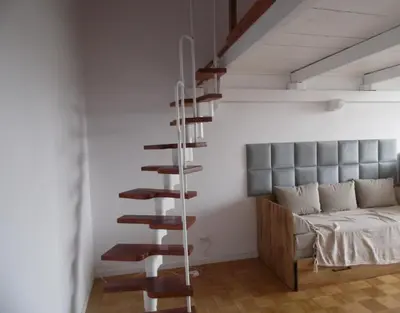 Łóżko lub łóżka w pokoju w obiekcie Mezzanine appartment