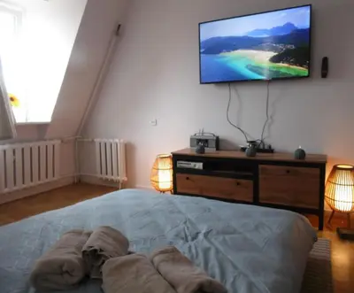 Łóżko lub łóżka w pokoju w obiekcie Mezzanine appartment