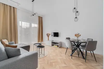 Część wypoczynkowa w obiekcie Młynarska 2B by Homeprime