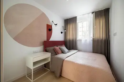 Łóżko lub łóżka w pokoju w obiekcie Camden Apartment - Wrocław Old Town