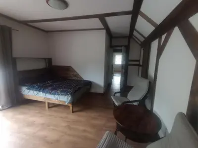 Łóżko lub łóżka w pokoju w obiekcie Chata za Świerkami
