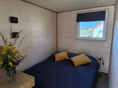 Łóżko lub łóżka w pokoju w obiekcie Dolina Baryczy 5 Kotów