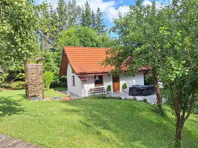 Ogród w obiekcie Domek Nad Strumykiem