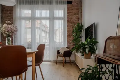 Telewizja i/lub zestaw kina domowego w obiekcie Studio 141 z podwójnym łóżkiem i rozkładaną sofą