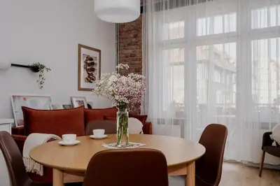 Część wypoczynkowa w obiekcie Studio 141 z podwójnym łóżkiem i rozkładaną sofą