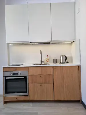Kuchnia lub aneks kuchenny w obiekcie Cozy Pokój