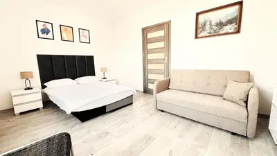 Łóżko lub łóżka w pokoju w obiekcie Apartament Rodzinny II
