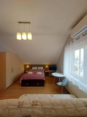 Łóżko lub łóżka w pokoju w obiekcie Relaks w Wilczycach