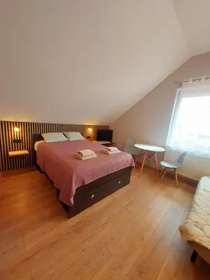 Łóżko lub łóżka w pokoju w obiekcie Relaks w Wilczycach