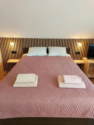 Łóżko lub łóżka w pokoju w obiekcie Relaks w Wilczycach
