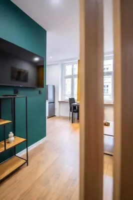 Telewizja i/lub zestaw kina domowego w obiekcie Apartament Łokietka