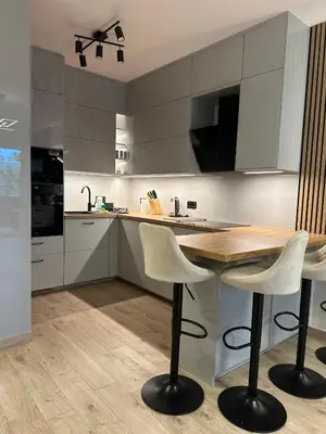 Kuchnia lub aneks kuchenny w obiekcie Luksusowy Apartament River Point Kępa Mieszczańska