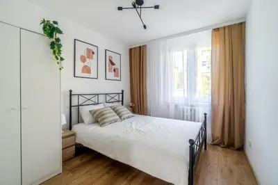 Łóżko lub łóżka w pokoju w obiekcie Apartament Słoneczny, PW Invest Home