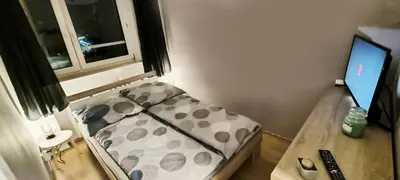 Telewizja i/lub zestaw kina domowego w obiekcie Apartament Opawska