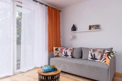 Część wypoczynkowa w obiekcie Paryski Zakątek Cosy Apartment by BookingHost