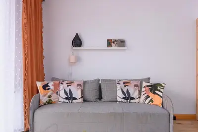 Łóżko lub łóżka w pokoju w obiekcie Paryski Zakątek Cosy Apartment by BookingHost