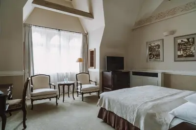 Łóżko lub łóżka w pokoju w obiekcie Art Hotel