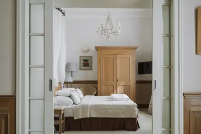 Łóżko lub łóżka w pokoju w obiekcie Art Hotel