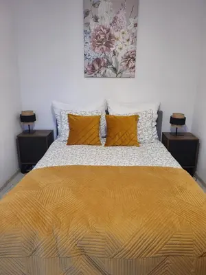 Łóżko lub łóżka w pokoju w obiekcie Apartament-Studio 1 Gliwice z balkonem