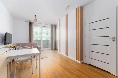 Telewizja i/lub zestaw kina domowego w obiekcie Park Skowroni Cosy Apartment by BookingHost