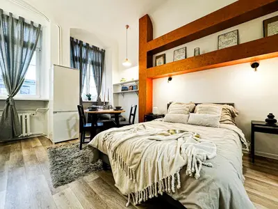 Łóżko lub łóżka w pokoju w obiekcie Walk 50m to Market Square & Rynek! Stylish 1BR, Kitchen