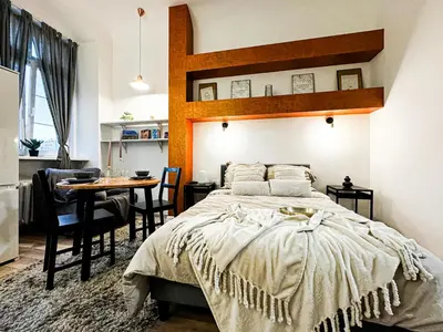 Łóżko lub łóżka w pokoju w obiekcie Walk 50m to Market Square & Rynek! Stylish 1BR, Kitchen