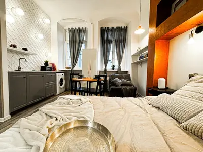 Łóżko lub łóżka w pokoju w obiekcie Walk 50m to Market Square & Rynek! Stylish 1BR, Kitchen