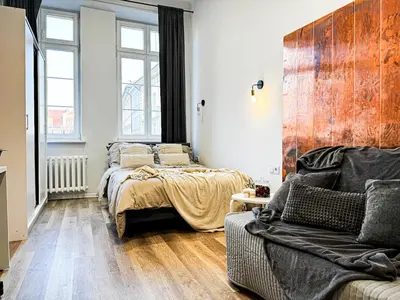 Łóżko lub łóżka w pokoju w obiekcie 1min Walk to Market Square, Beautiful Views! Stylish 1BR Kitchen