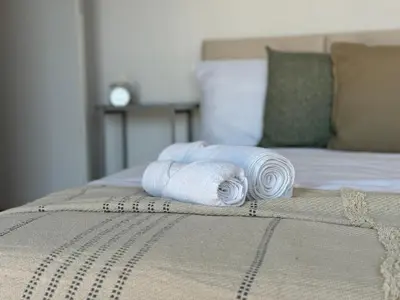 Łóżko lub łóżka w pokoju w obiekcie Kościuszki 4 Comfort Suites