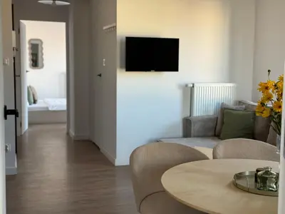 Telewizja i/lub zestaw kina domowego w obiekcie Kościuszki 4 Comfort Suites