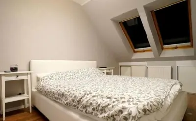 Łóżko lub łóżka w pokoju w obiekcie Staycity Stadion Apartment
