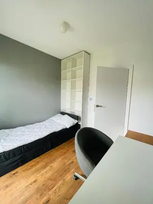 Łóżko lub łóżka w pokoju w obiekcie Staycity Stadion Apartment