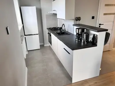 Kuchnia lub aneks kuchenny w obiekcie Apartament Piast