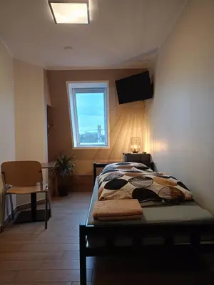 Łóżko lub łóżka w pokoju w obiekcie AE BERG Apartamenty