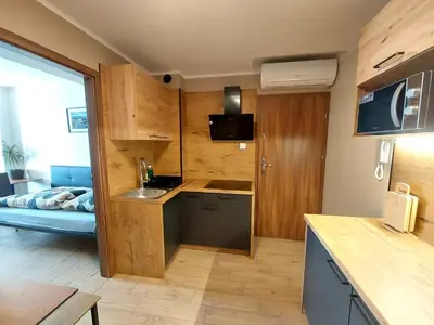 Kuchnia lub aneks kuchenny w obiekcie AE BERG Apartamenty