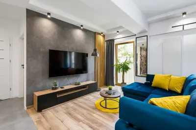 Telewizja i/lub zestaw kina domowego w obiekcie Zygmunta Starego 2-Bedroom Condo