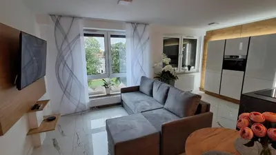 Telewizja i/lub zestaw kina domowego w obiekcie Apartament 100-Brawa 26