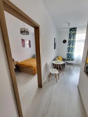 Łóżko lub łóżka w pokoju w obiekcie Apartament - Studio 2 Gliwice