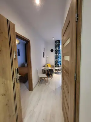 Łóżko lub łóżka w pokoju w obiekcie Apartament - Studio 2 Gliwice