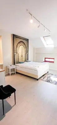Łóżko lub łóżka w pokoju w obiekcie Apartamenty Castello Kamilla